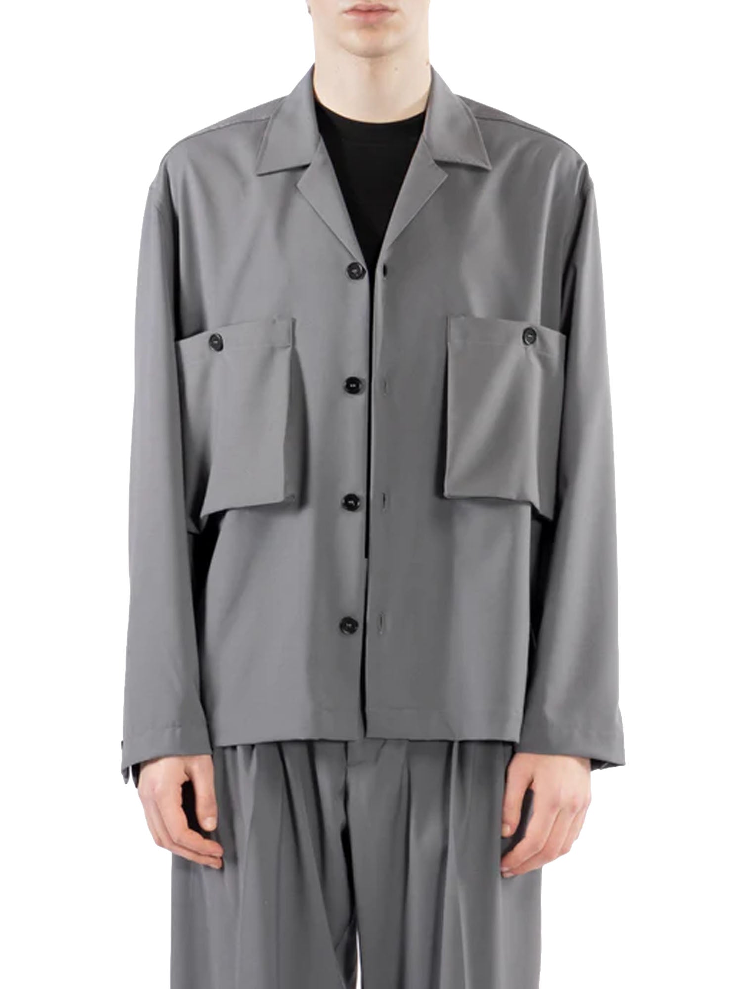 Chemise à col ouvert avec poches