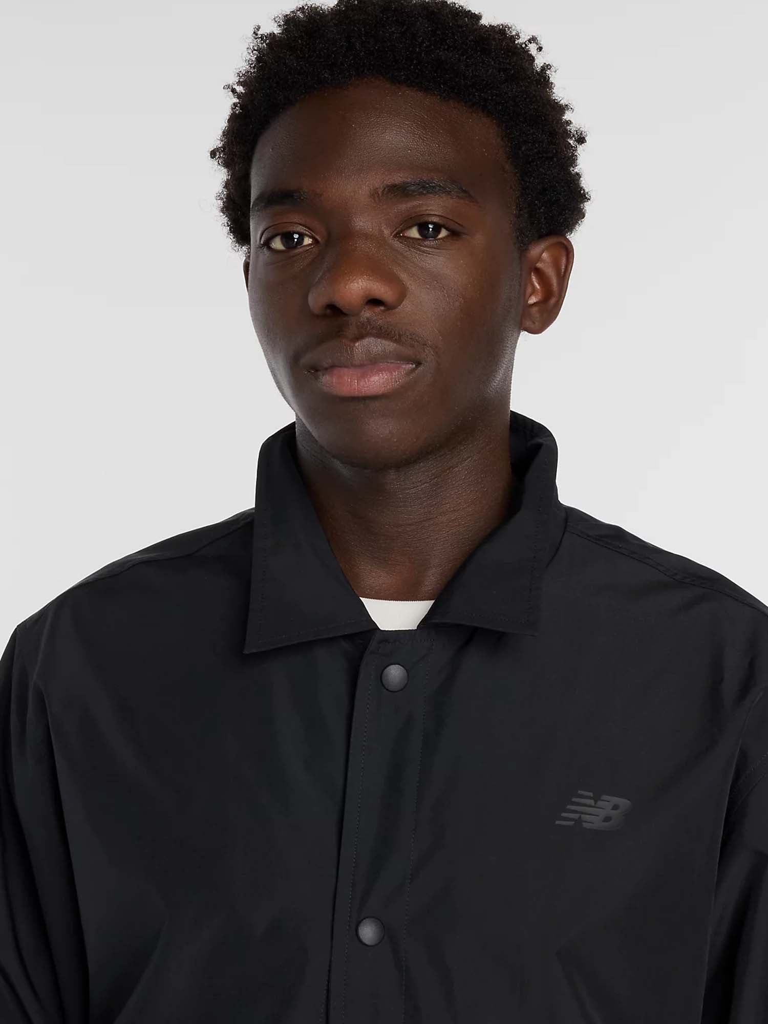 New Balance Giacca Lightweight Coaches Nero