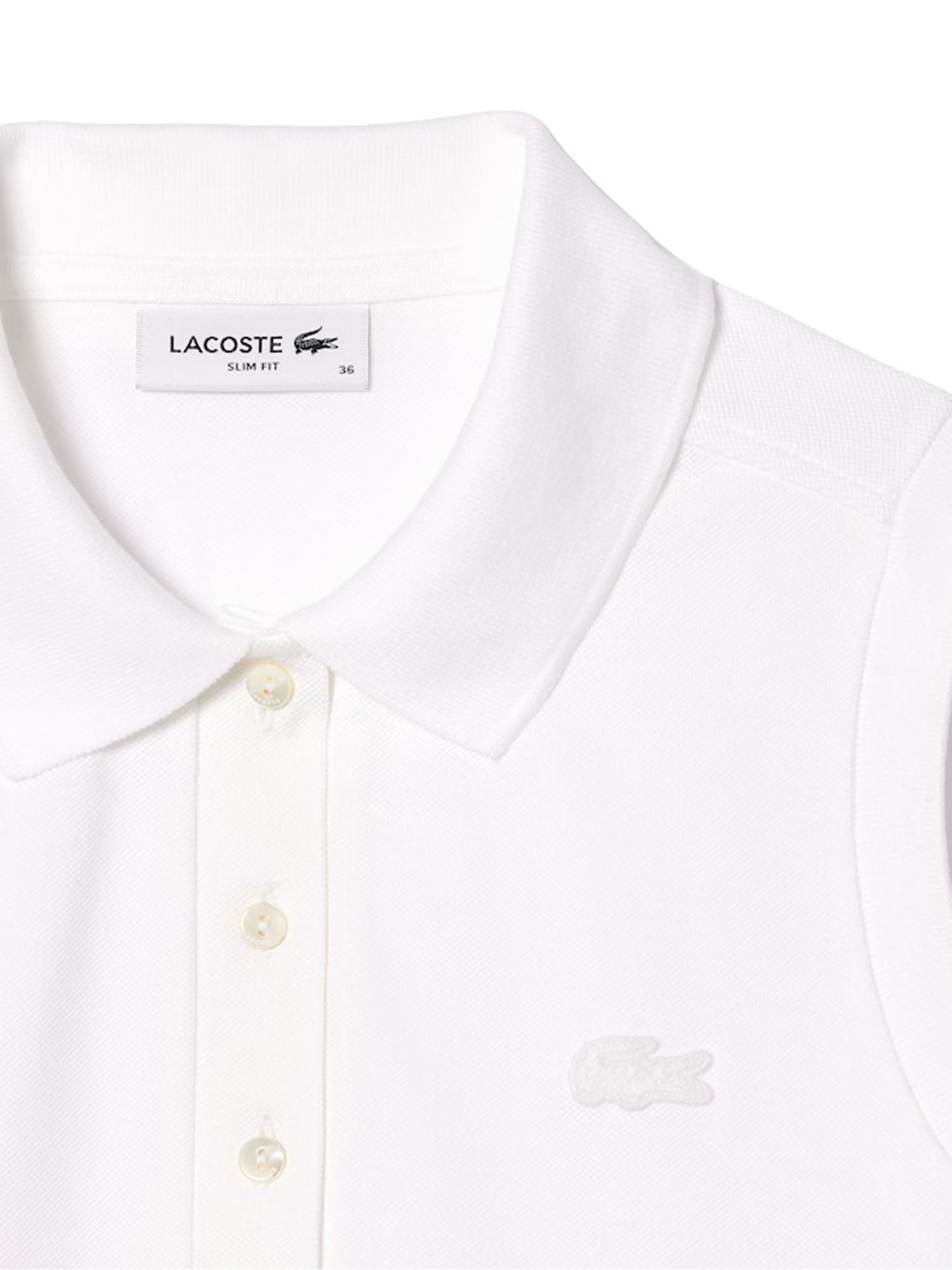 Lacoste Polo slim fit senza maniche elasticizzata L.12.D Bianco
