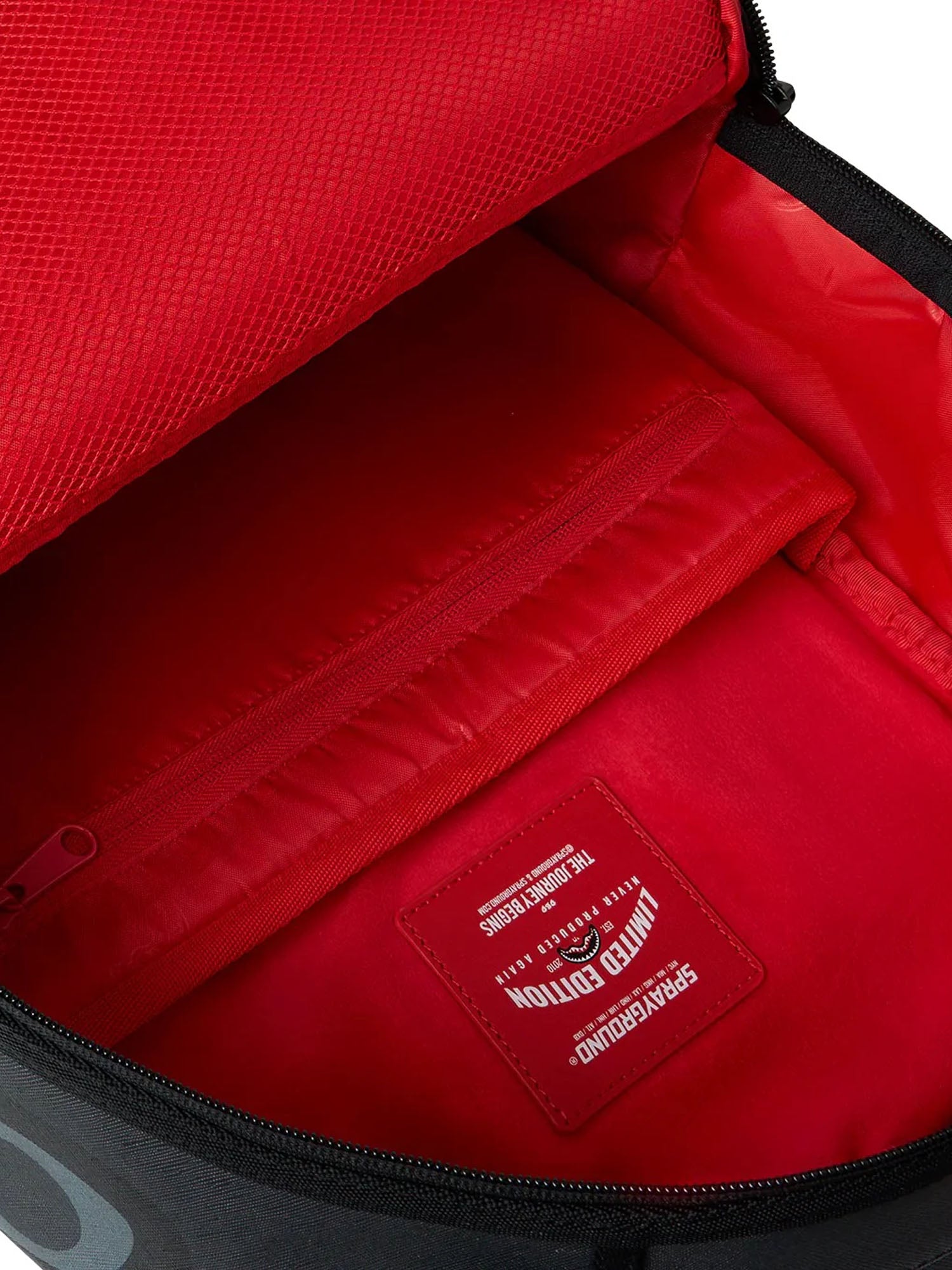 Sprayground Center Rip Revealing Gray Check Nero